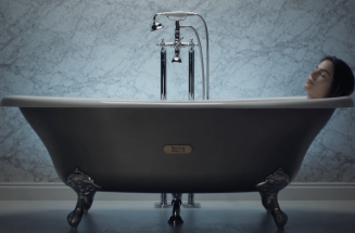 Relaxed woman on a Roca bathtub